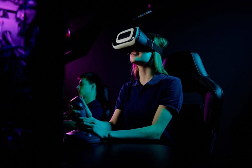 Girl in vr goggles using joystick handle